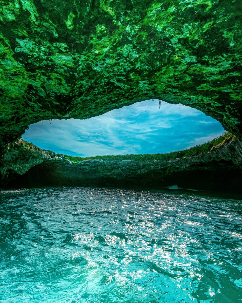 pexels-photo-12458141-12458141 Explore the stunning natural beauty of the Hidden Beach in Marietas Islands, Mexico, with its unique cave opening.